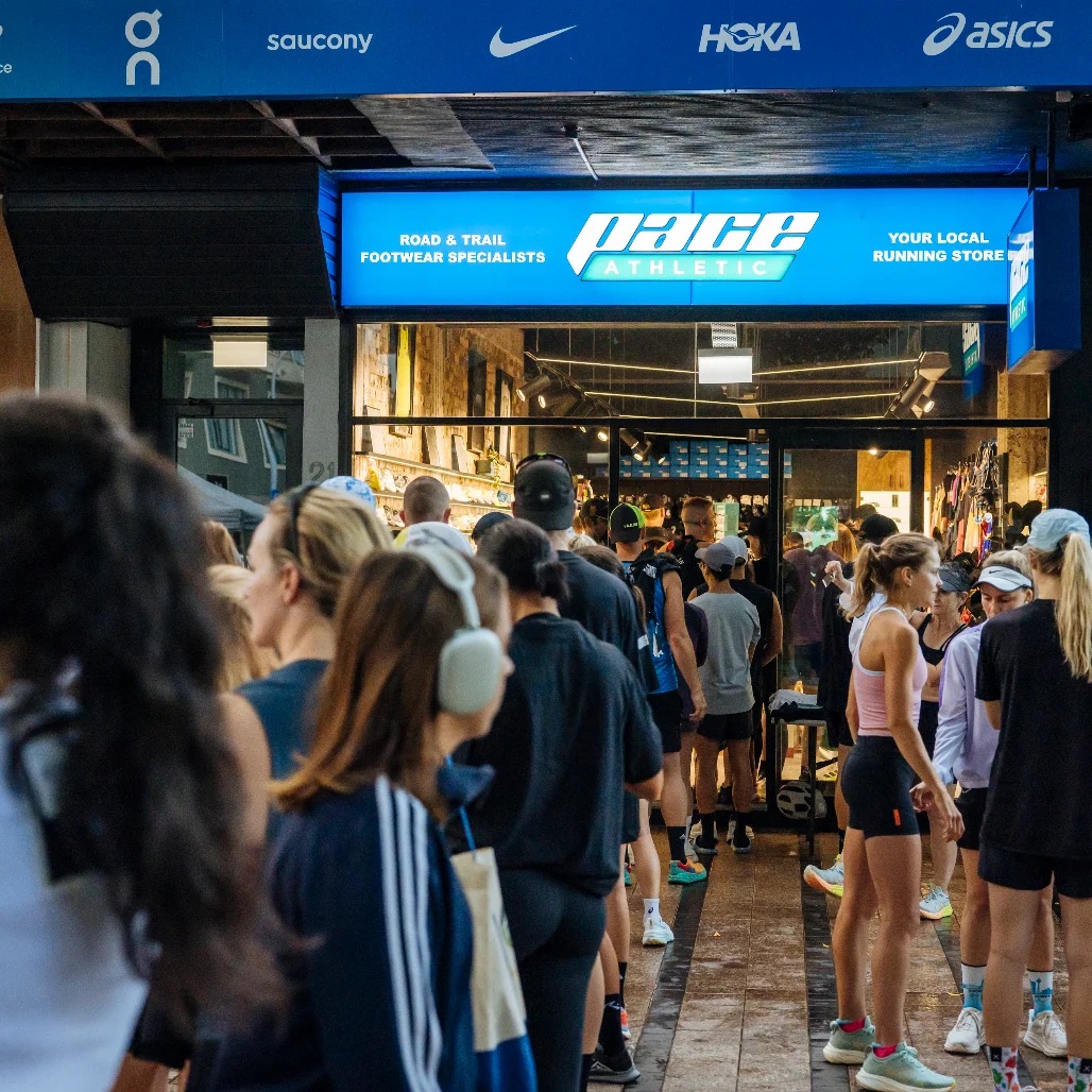 Runners queuing outside a Pace Athletic store